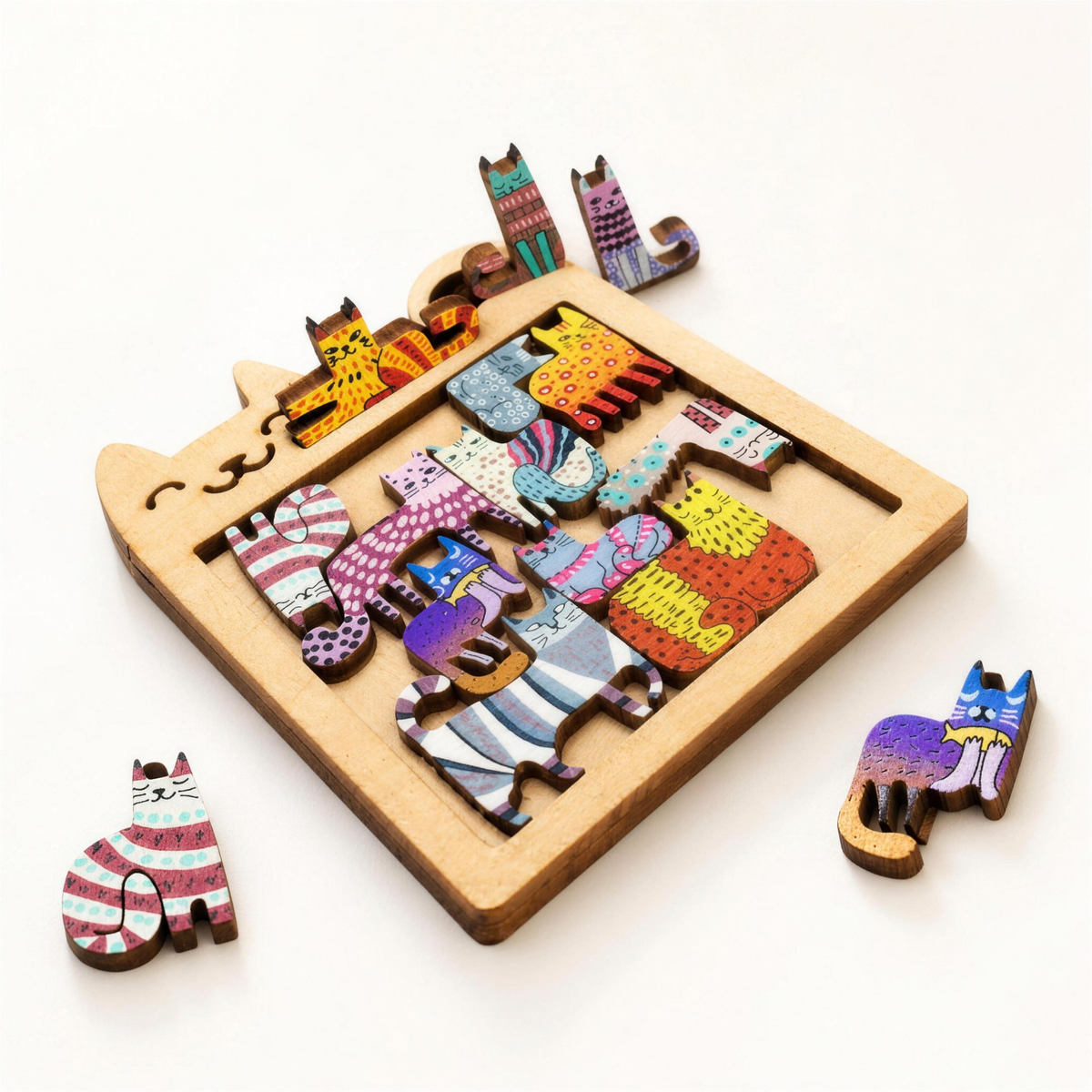 Wooden cat shaped puzzle on a bright white background