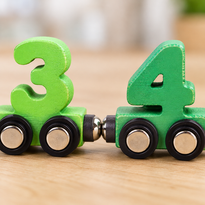Close-up of number cars 3 and 4 joined by magnets